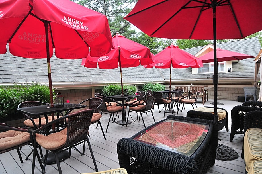 Moose on the Roof outside seating with table umbrellas